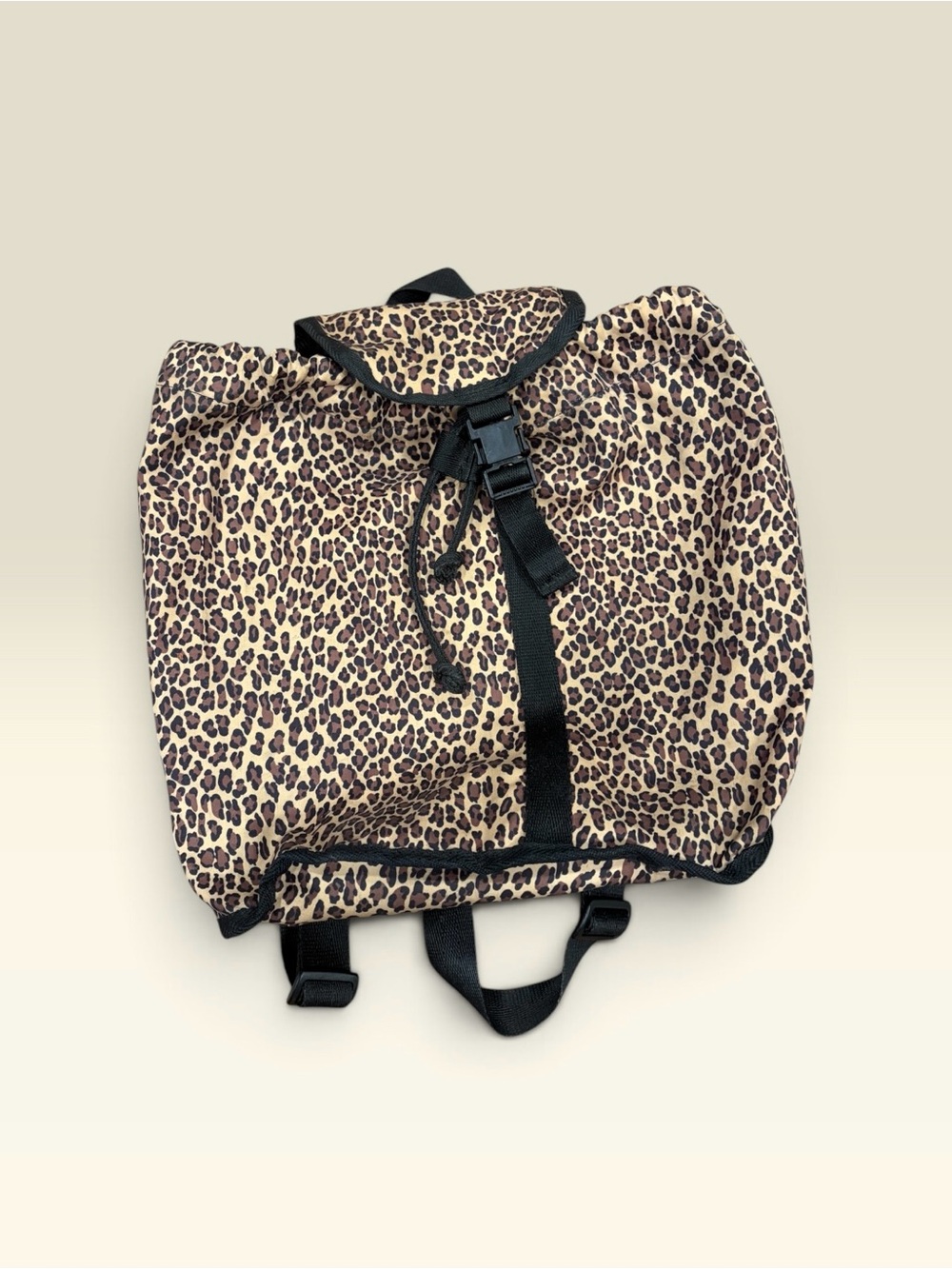 Lesportsac Leopard Print Backpack with Black Trim in Water Resistant Nylon